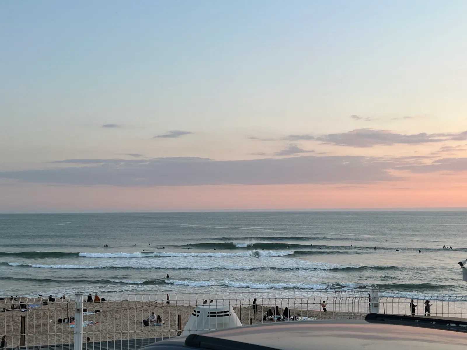 Carcavelos beach near Lisbon, busy with surfers